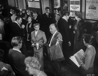 Alfred Hitchcock directing on a film set photo print