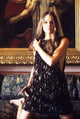 Michelle Phillips kneeling in black dress photo print.