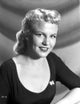Peggy Lee smiling in black tights portrait photo print