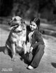 Virginia Weidler kneeling with dog photo print, nostalgic film art.