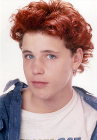 Corey Haim posed photo print on white background, classic Hollywood star.