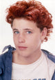 Corey Haim posed photo print on white background, classic Hollywood star.
