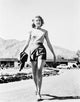 Grace Kelly wearing shorts vintage photo print.