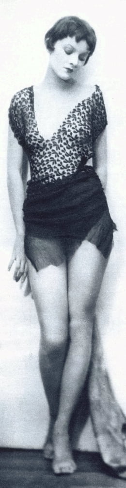 Myrna Loy classic photo print in black skirt, available in various sizes.