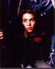 Photo print of Jonathan Brandis in red turtleneck and coat.