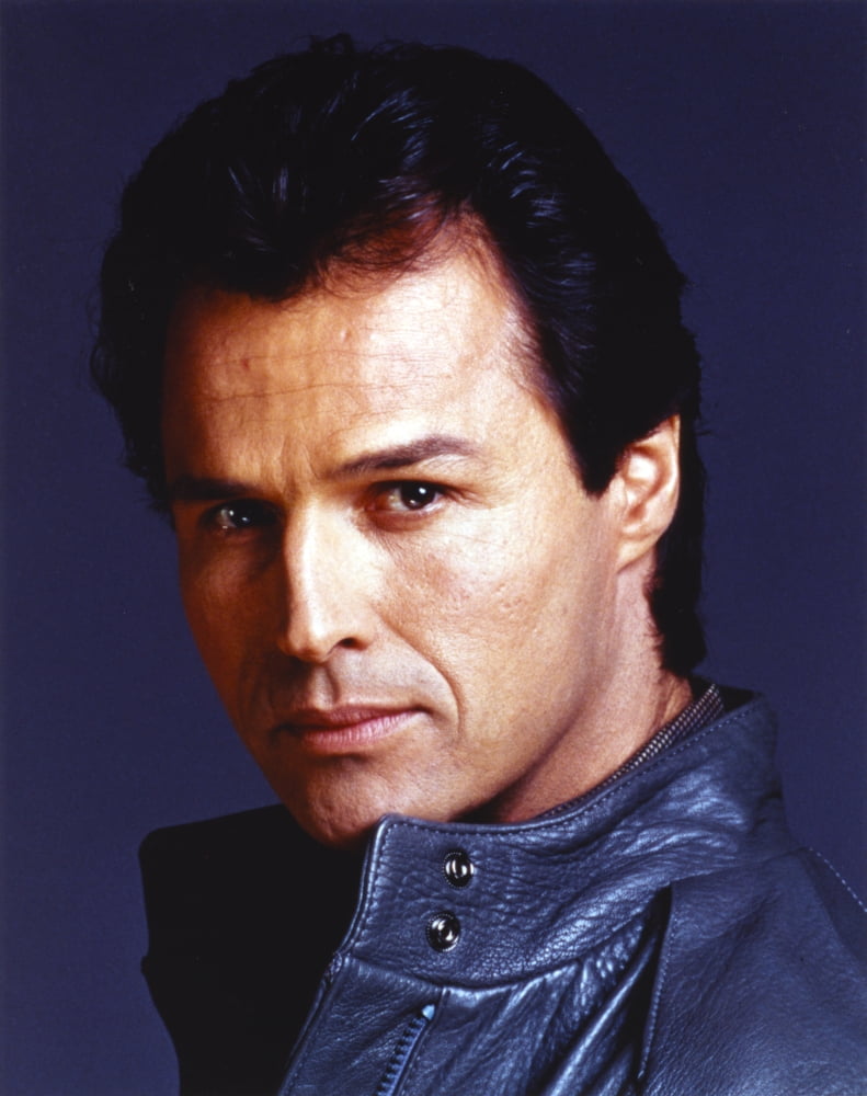 Close-up portrait photo print of Michael Nader in a black leather jacket.