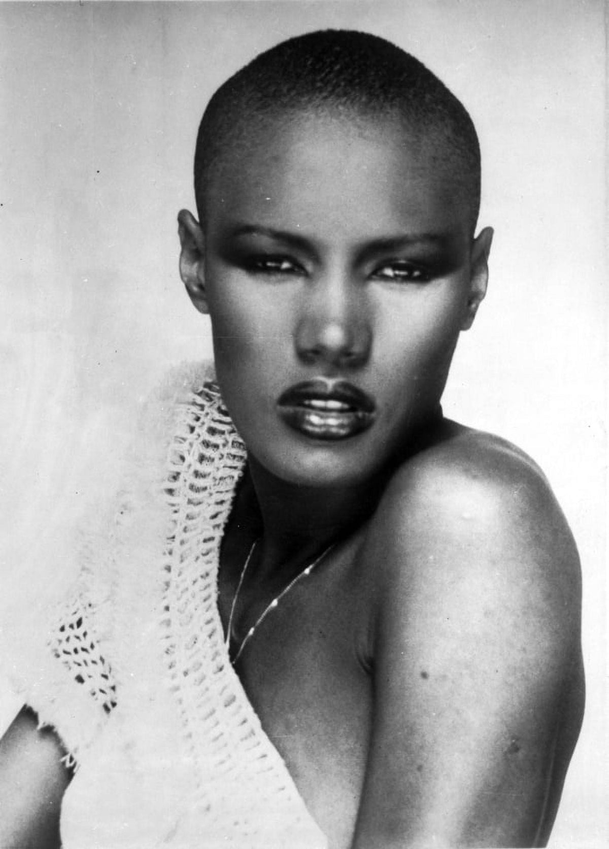 Portrait of Grace Jones in vibrant red lipstick photo print.