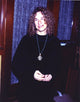 Carole King posed in an elegant black dress photo print
