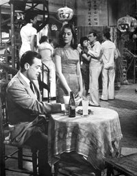 World Of Suzie Wong movie scene photo print featuring a man and woman.