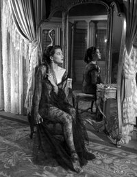 Yvonne De Carlo black and white photo print in side view wearing a black dress.