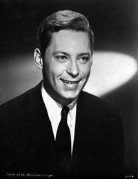 John Kerr smiling photo print, available in multiple sizes, perfect for fans and collectors.