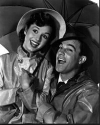 Black and white photo print of Gene Kelly and Debbie Reynolds in Singin' In The Rain