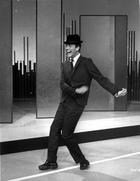 Dick Van Dyke dancing photo print, capturing classic entertainment joy.