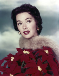 Close-up portrait of Barbara Rush in a red flower dress photo print