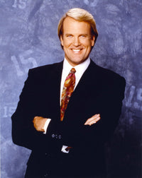 John Tesh posed elegantly in a brown tie photo print