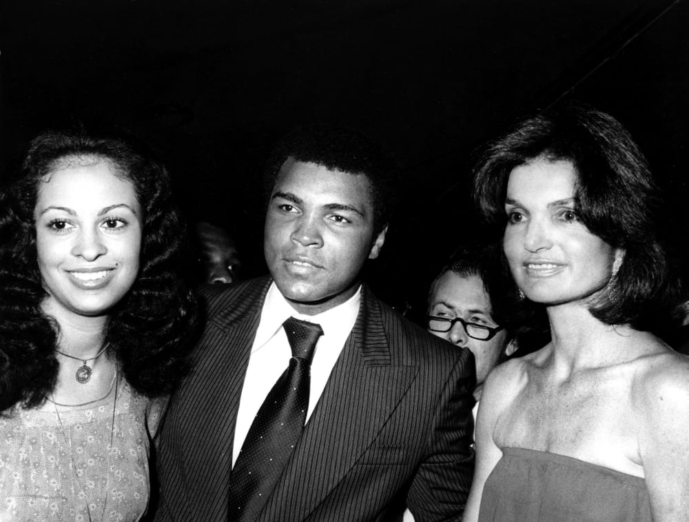 Muhammad Ali and Jacqueline Kennedy Onassis photo print, iconic personalities captured in a stunning image.