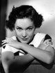 Maureen O'Sullivan leaning with arms crossed photo print