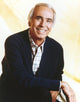 Tom Snyder smiling portrait photo print in multiple sizes.