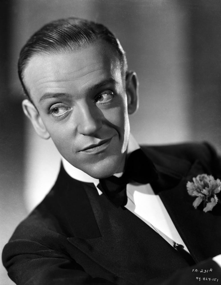 Fred Astaire smiling in a classic suit and black bow tie photo print