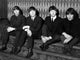 The Beatles iconic photo print showcasing the legendary band.