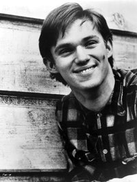 Richard Thomas wearing a patterned shirt photo print.