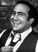 Danny DeVito smiling photo print, available in multiple sizes.