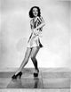 Ruby Keeler posed in a striped shirt photo print.
