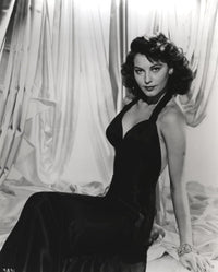 Ava Gardner reclining in a black gown photo print