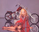 Ann Margret Red Motorcycle Photo Print in multiple sizes.