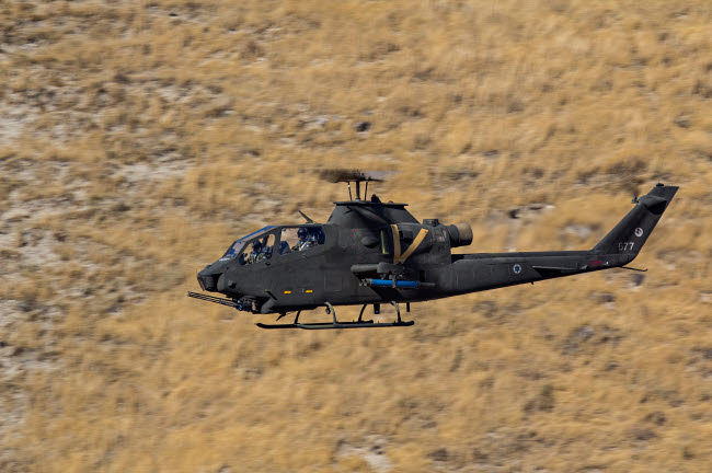 AH-1F Tzefa Israeli Air Force flying over Israel poster print.