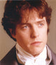 Hugh Grant photo print in printed polo hugging a woman, 8x10