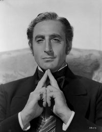 Portrait of Basil Rathbone Photo Print showcasing classic Hollywood charm.
