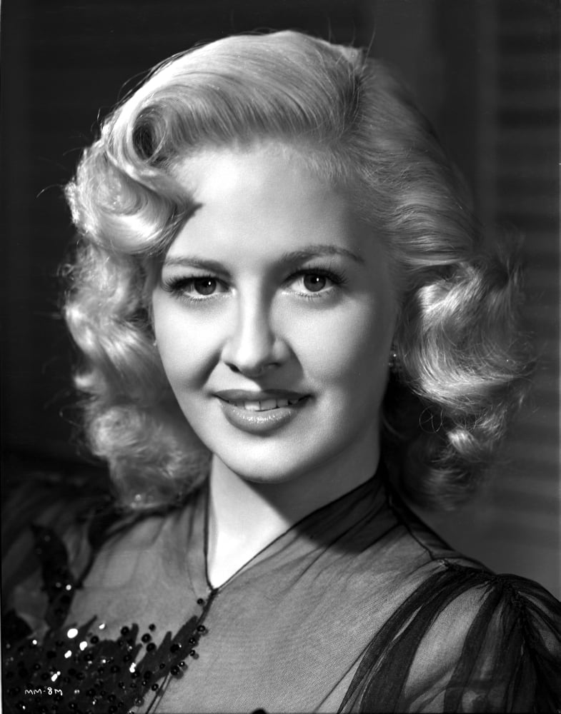 Marilyn Maxwell posed elegantly in a black dress photo print.