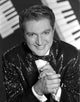 Liberace iconic photo print showcasing his flamboyant style.