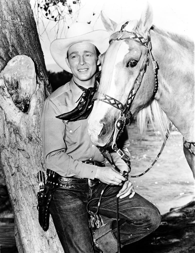 Roy Rogers Cowboy Photo Print featuring classic western attire with a horse.