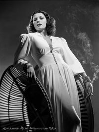 Rita Hayworth leaning and smoking pose photo print, vintage Hollywood art.