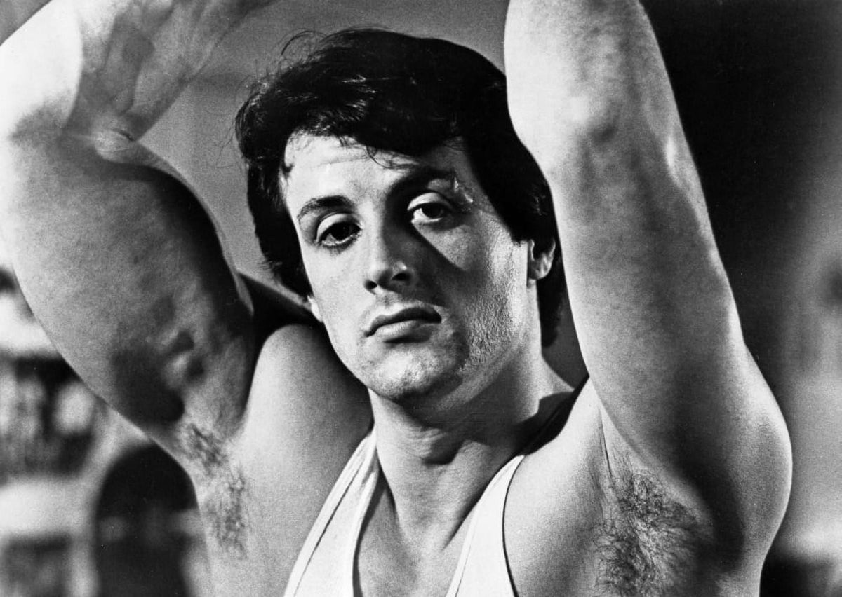 Sylvester Stallone photo print with hands raised in tank top