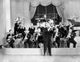 Artie Shaw performing photo print showcasing jazz musician in action.