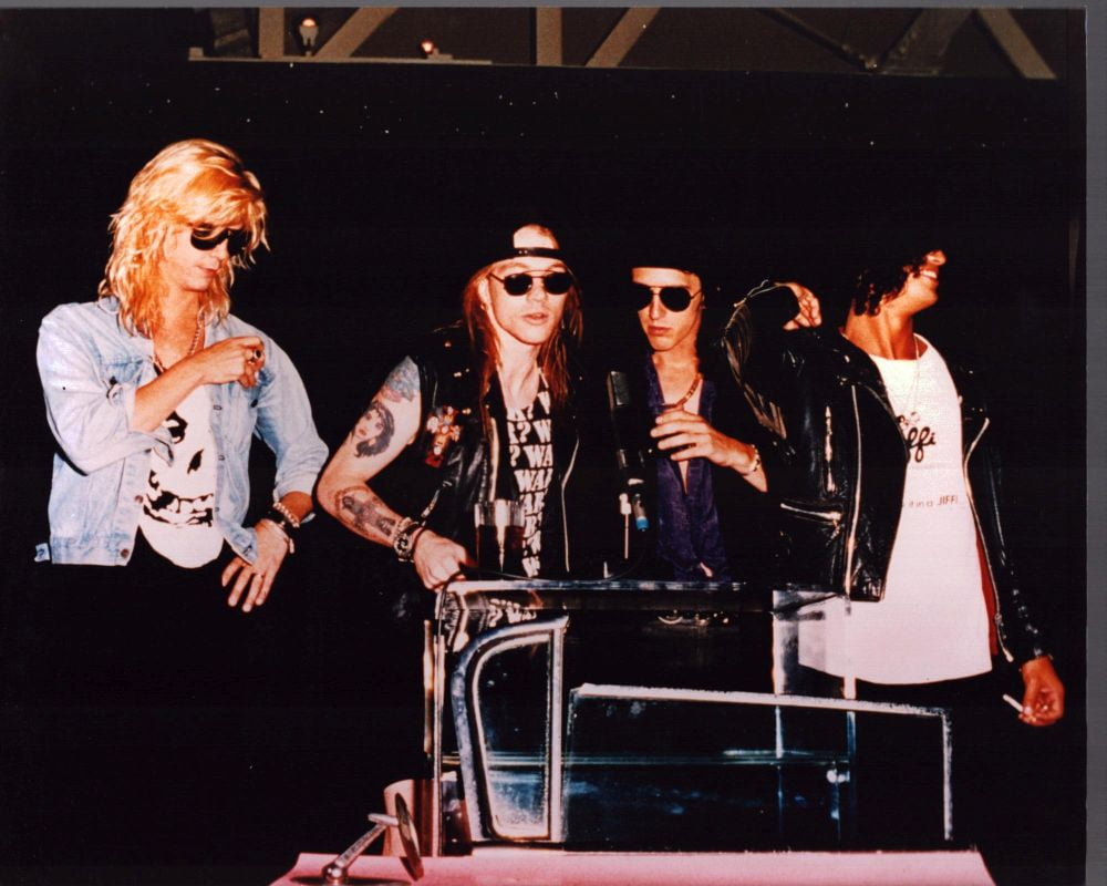 Guns N' Roses concert photo print capturing the band at the podium.