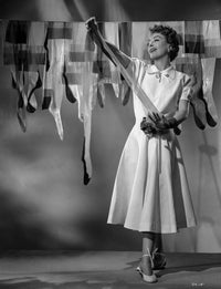 Joan Crawford classic portrait photo print hanging her stockings.