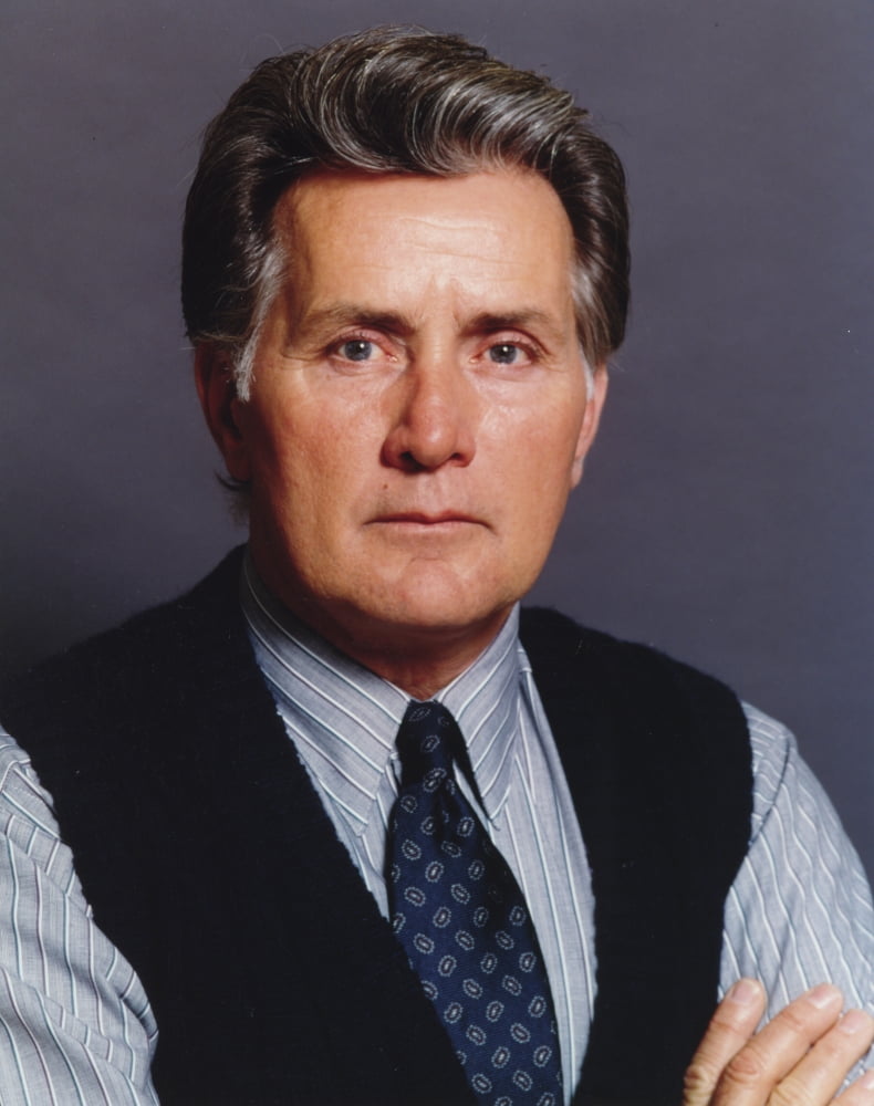 Martin Sheen portrait photo print in black vest and white shirt.