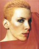 Annie Lennox close-up photo print with red background