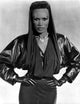 Grace Jones wearing a black gown and gloves - Elegant fashion photo print