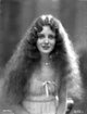 Portrait of Mary Astor photo print showcasing vintage Hollywood elegance.