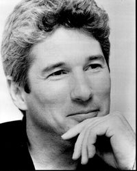 Close-up black and white photo print of Richard Gere with hand on chin.