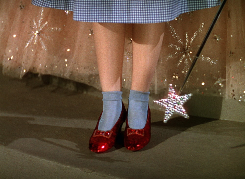 The Wizard of Oz Photo Print showcasing iconic scenes from the classic film.