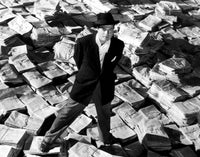 Citizen Kane photo print featuring Orson Welles surrounded by newspapers.