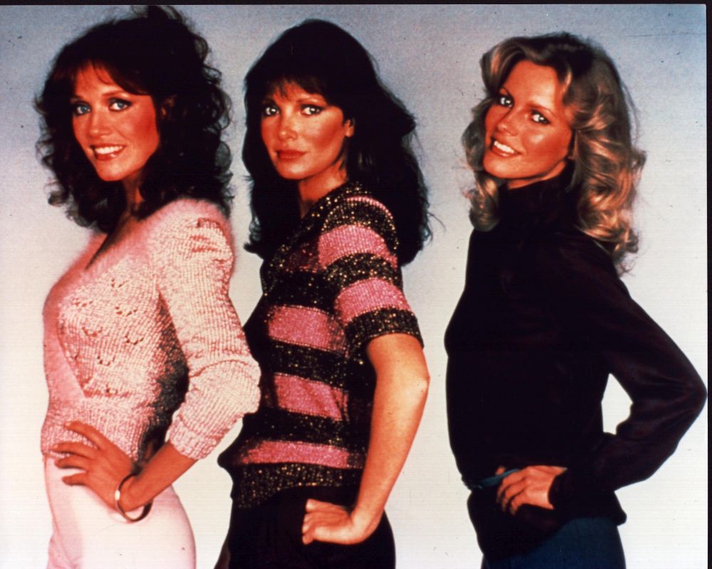 Charlie's Angels photo print featuring Tanya Roberts, Jaclyn Smith, and Cheryl Ladd striking hands on hips pose.