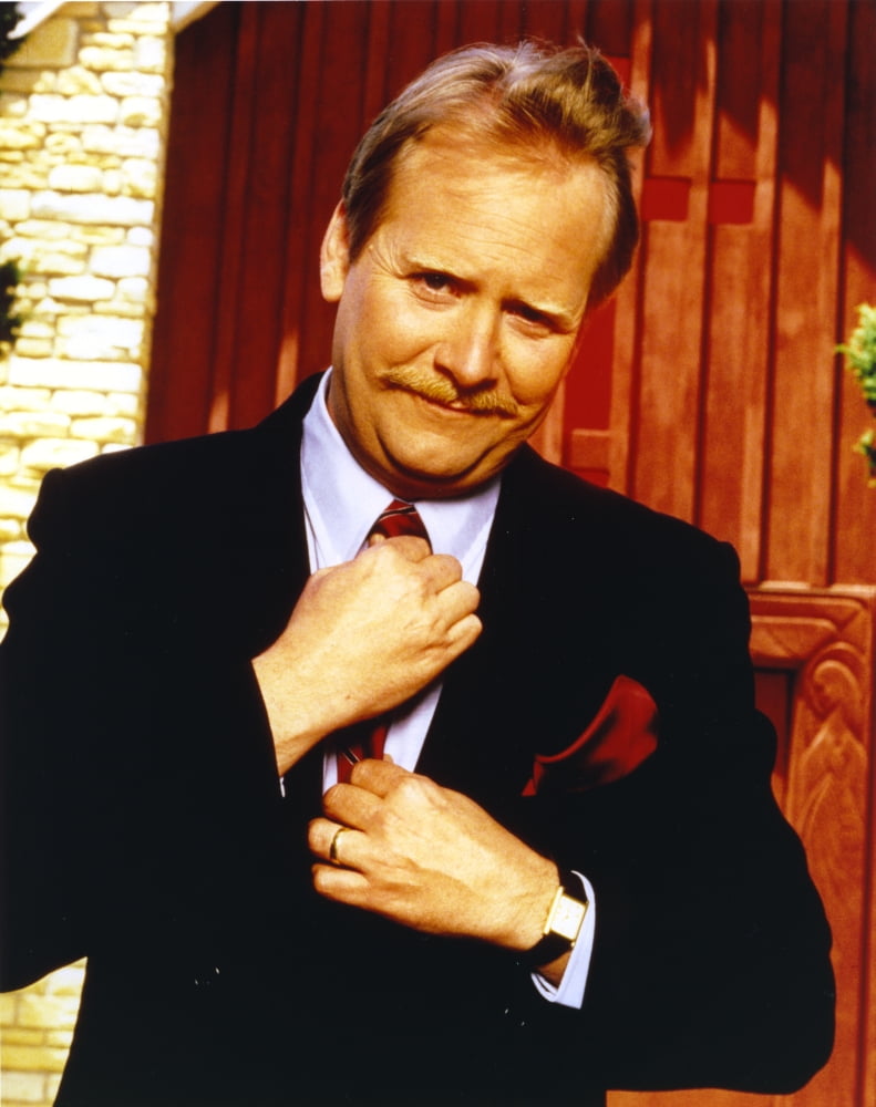Martin Mull posed in tuxedo photo print, available in various sizes.