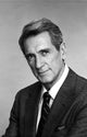 Rock Hudson posed in a black suit photo print, classic Hollywood style.